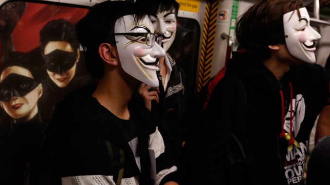 LIVE - Million Mask March floods London streets