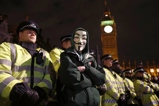 Riot police on alert for bonfire night 'Million Mask March' by activists Anonymous