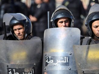 Police fire tear gas as Mubarak verdict brings protests to Tahir Square in Cairo