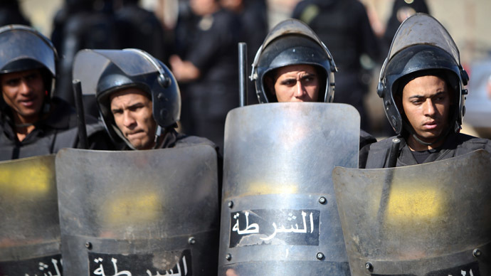 Police fire tear gas as Mubarak verdict brings protests to Tahir Square in Cairo
