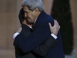 US woos France with hugs and kisses to make up for snubbing terror march