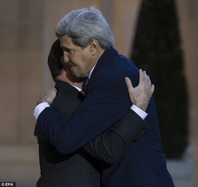 US woos France with hugs and kisses to make up for snubbing terror march