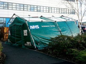 Hospital forced to erect TENT in car park as non urgent operations are cancelled