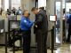 US steps up airport, federal building security after Paris attacks