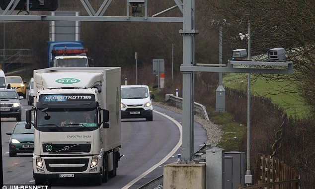 Company behind 'sneaky' new motorway speed cameras is paid £2.1million by the taxpayer so they can catch MORE drivers