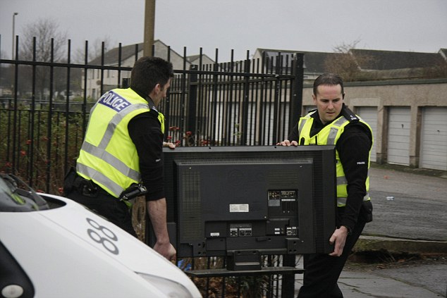 TEN vehicles and Police in riot gear sent to deal with noisy TV
