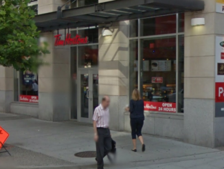 Coffee giant apologises after store owner pours water over homeless man and his dog