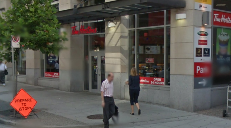 Coffee giant apologises after store owner pours water over homeless man and his dog