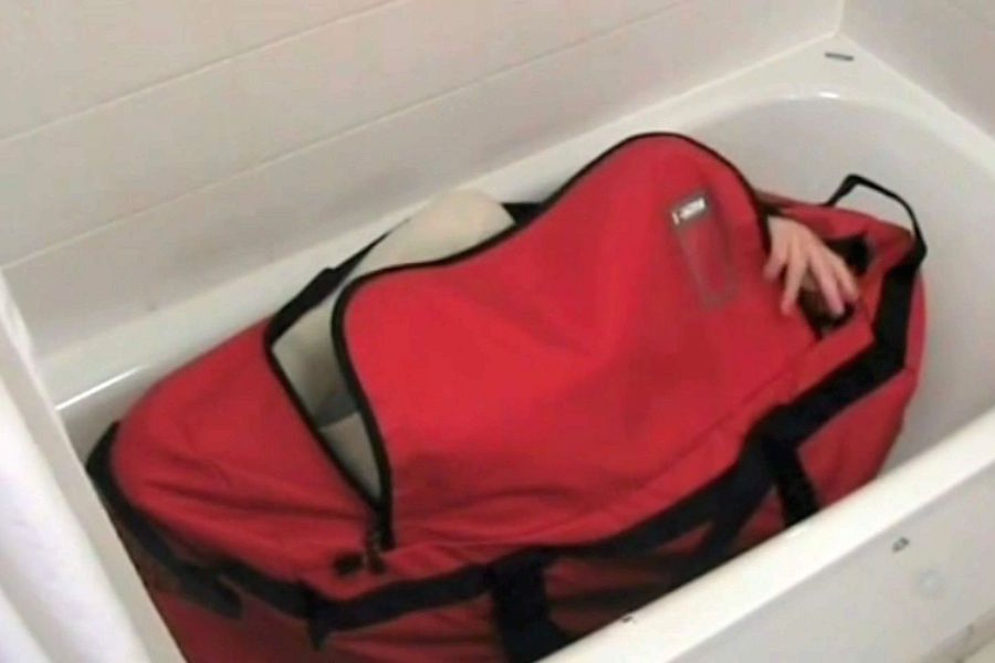 Bodybag MI6 agent had hacked secret info on the Clintons