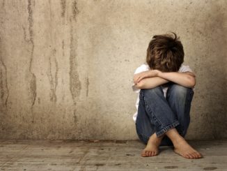 A 13-year-old school boy has been accused of assaulting a girl because he dared to try and kiss her