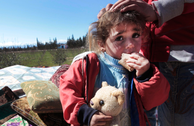Syrian refugee crisis - Syrian refugees - small child - little Syrian girl with toy bear