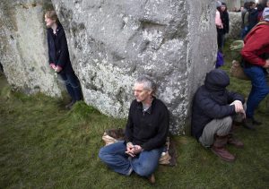 Revellers celebrate the winter solstice at Stonehenge on Salisbury Plain in southern England