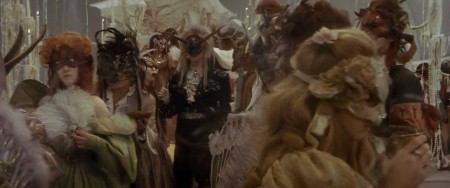 Jareth waiting for Sarah behind a horned masked at the Illuminati ball. 