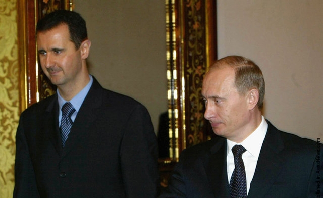 Putin says Russia may grant President Assad asylum