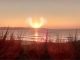 Angel Cloud Formation Appears In The Sky Above Beach In Cornwall