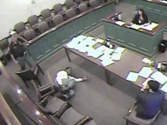 Sadistic judge orders cop to electrocute helpless man in courtroom