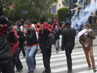 Riot Police Clash With Protesters In France