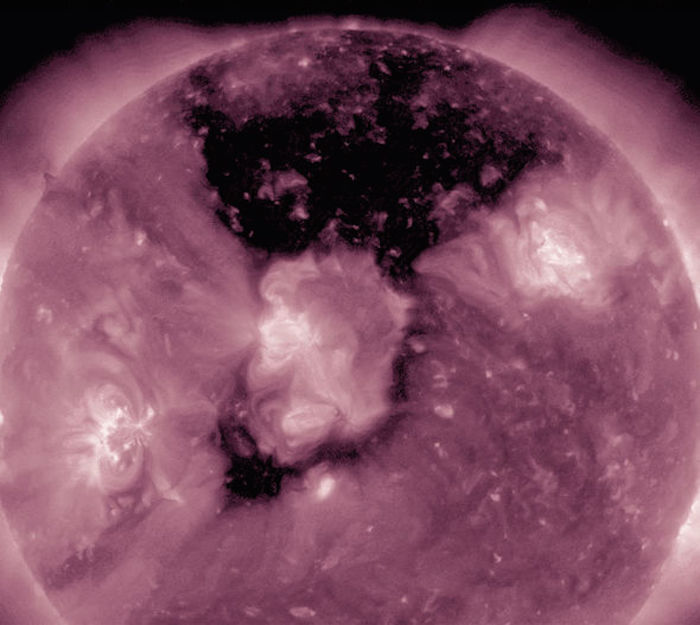 NASA reveals that a huge hole has appeared on the surface of the Sun which appears to be swallowing the giant star up
