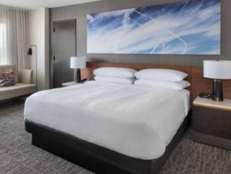 High-end hotel chain JW Marriott has been accused of attempting to normalize the chemtrail agenda by placing artworks on their walls featuring chemtrails sprayed on blue skies.