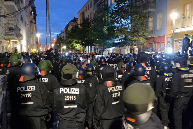 Revolution spreads to Germany as riot police deployed