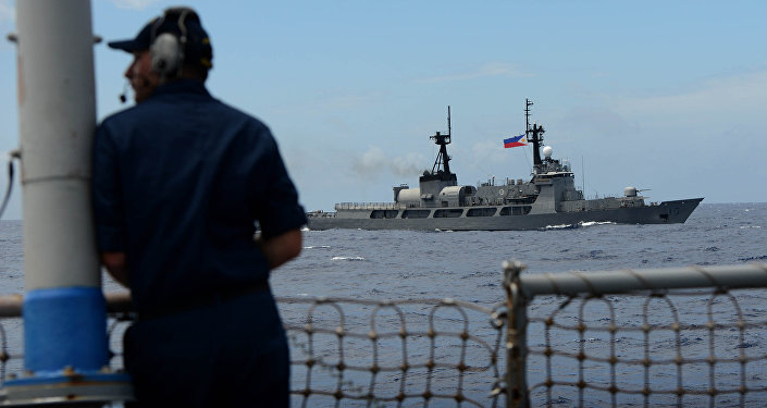 Beijing conducts war games in South China Sea