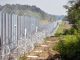 After months spent criticising Donald Trump's plan to build a border wall as fascist, ignorant and morally wrong, the Democratic National Committee has erected a four mile, eight foot high fence around the site of the convention in Philadelphia.