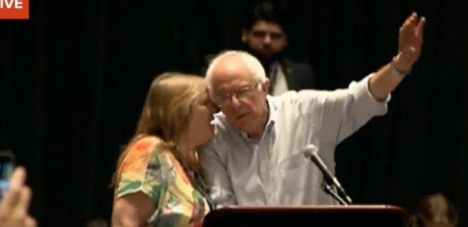 After Bernie Sanders’ speech to his delegates, his wife Jane Sanders got on stage with him and whispered in his ear, over a hot mic, "They don’t know your name is being put in nomination. That’s what concerns."