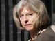 British Prime Minister Theresa May says paedophiles should be allowed to adopt