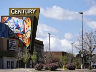 Aurora massacre survivors told to pay $700,000 in legal fees to theater