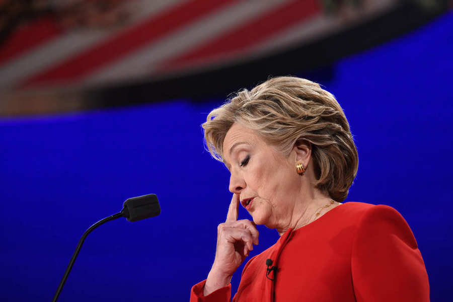 Poker pro Mike Matusow claims Hillary Clinton and debate moderator Lester Holt secretly communicated using hand signals during the debate.