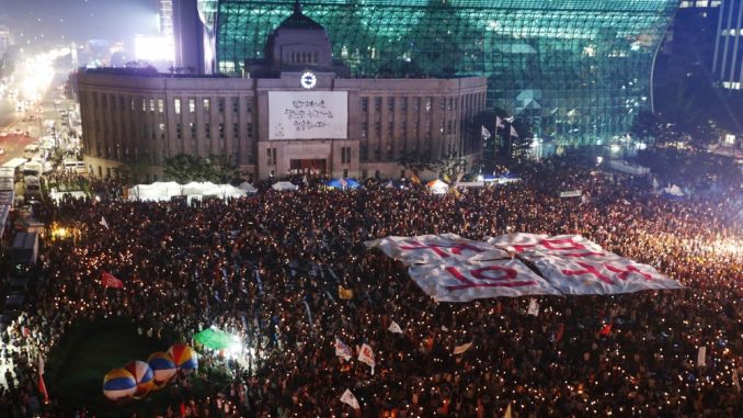 South Koreans are rising up in their millions and demanding the overthrow of a covert shadow government running their country.