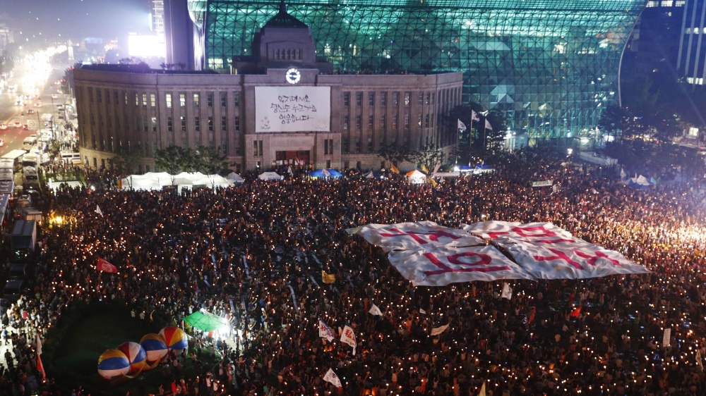 South Koreans are rising up in their millions and demanding the overthrow of a covert shadow government running their country.