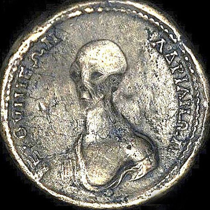 The discovery of an ancient Egyptian coin depicting an alien-like creature is proof that UFOs and aliens have visited Earth, researchers say.