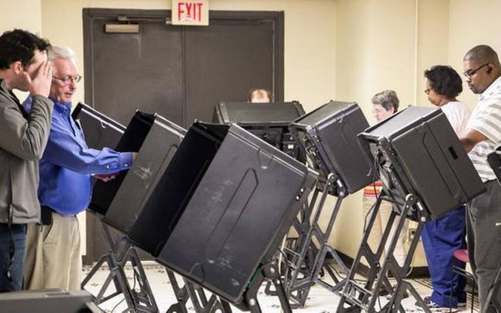 A voting machine has been caught on camera casting a ballot for a Democrat after the voter selected a Republican.