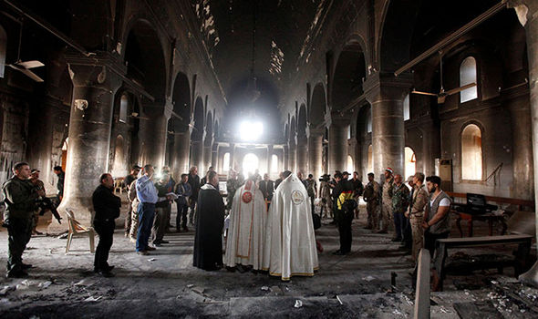 The torched-out shell of the massive Church of the Immaculate Conception.