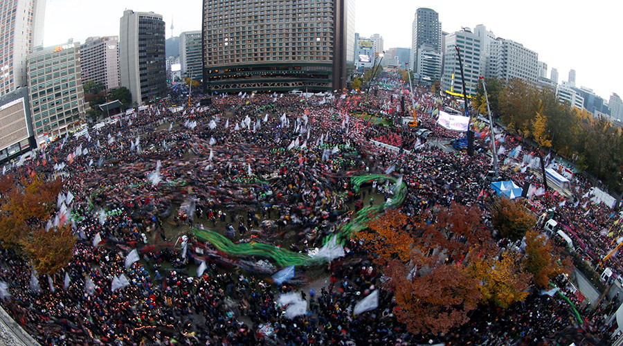 100,000s Protest In South Korea To Demand President Resign