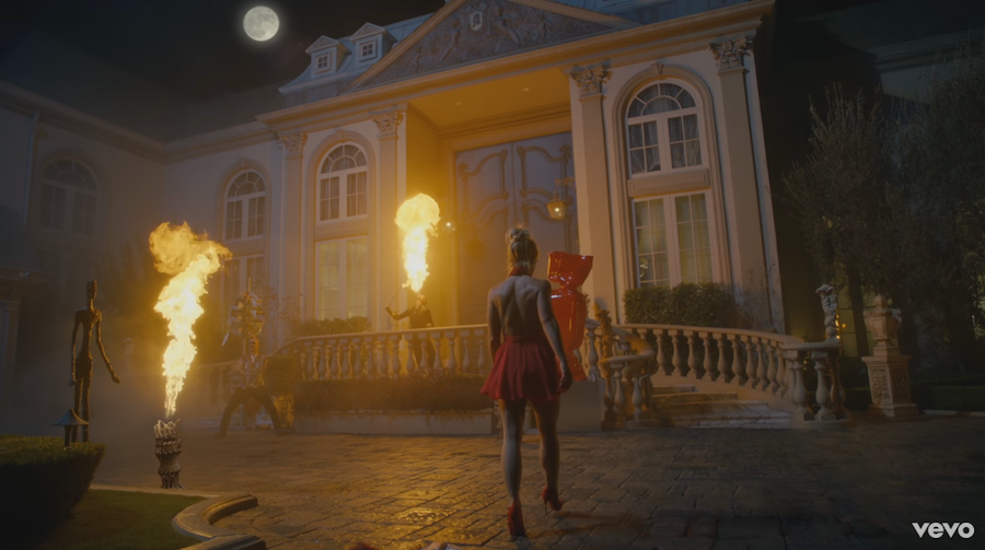 Britney Spears' new music video Slumber Party is infused with Illuminati and occult symbolism.