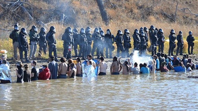 Native Americans at Standing Rock, North Dakota are being sprayed with chemical weapons, according to protestor Candida Rodriguez Kingbird.