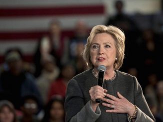 A scheduled speaker at a Hillary Clinton rally went off-script and began listing reasons why the audience shouldn't vote for her - until he was physically removed from the stage!