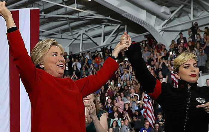 Lady Gaga rocked a futuristic Nazi uniform at a Hillary rally in North Carolina yesterday, throwing her weight behind the Clinton camp's assault on the First and Second Ammendments.