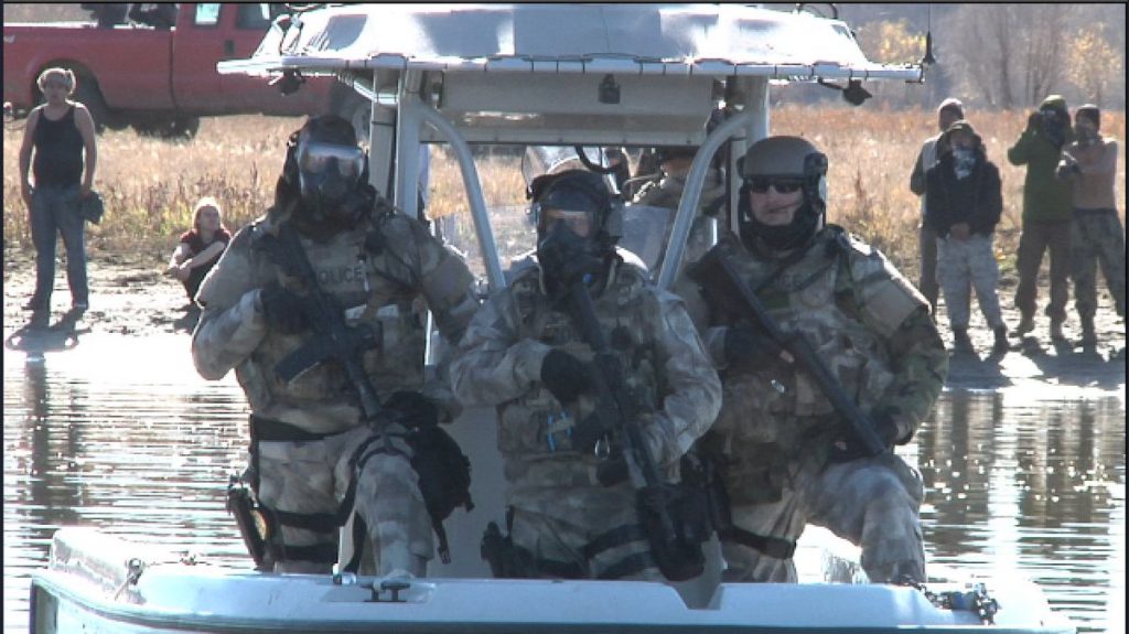 Journalist Erin Schroeder was shot by riot police while interviewing a protestor at Standing Rock, as violence continues to escalate in North Dakota.