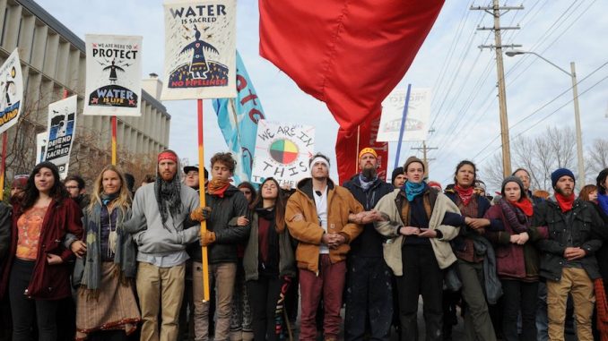 Veterans form a human shield for protestors in North Dakota
