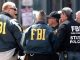 FBI investigate US police force pedophile ring