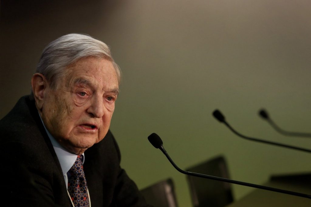 George Soros has issued a scathing attack to Donald Trump, accusing him of being "evil" and urging Americans to rise up and "fight Trump".