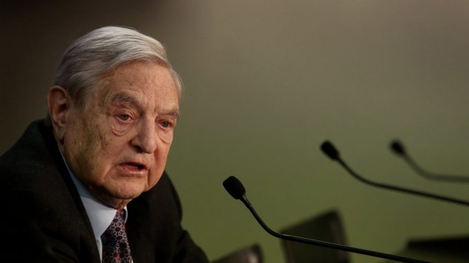 George Soros has issued a scathing attack to Donald Trump, accusing him of being "evil" and urging Americans to rise up and "fight Trump".