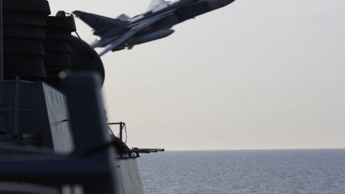 Russian fighter jet shoots at US destroyer putting military on 'red alert'