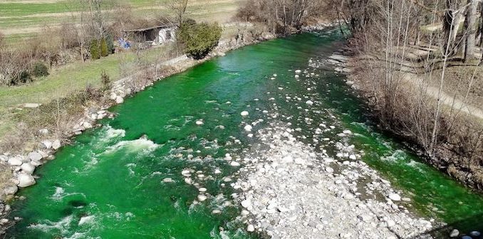 Spanish rivers turn luminous green sparking fears that Spanish government poisoned its citizens