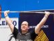 A transgender woman who was a man until a few years ago won her first international women's weightlifting title in Australia on Monday.