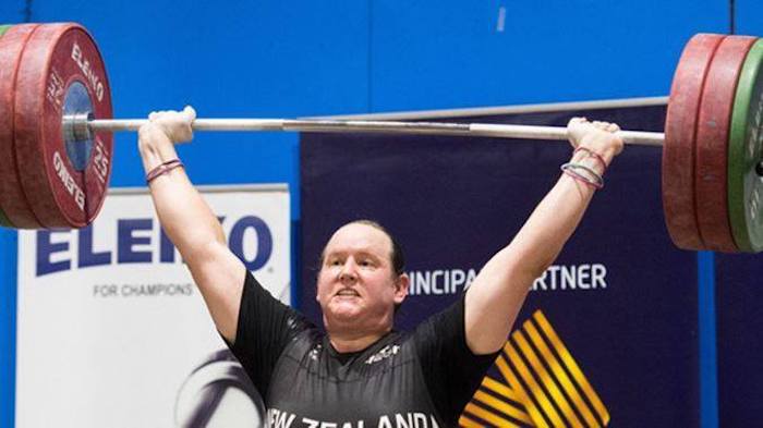 A transgender woman who was a man until a few years ago won her first international women's weightlifting title in Australia on Monday.
