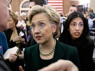 Two of Huma Abedin's cousins have been arrested and she has been named, along with Hillary Clinton's State Department, in a US Department of Justice prosecution